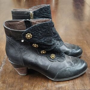 Chic Black Leather Ankle Booties with Gold Accents